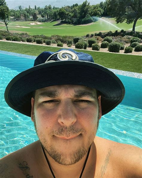 rob kardashian posts shirtless poolside selfie