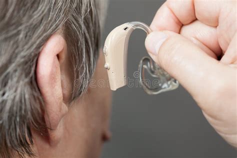 Closeup Senior Woman Using Hearing Aid Stock Image Image Of Older