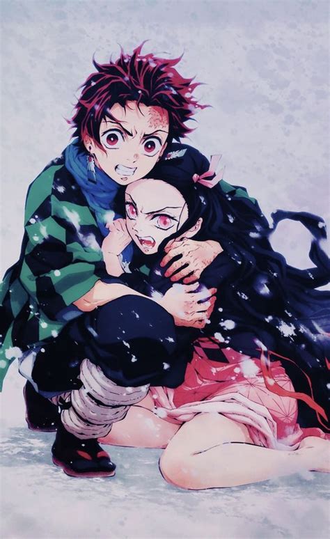 Two People Are Hugging In The Snow While One Person Is Wearing Black