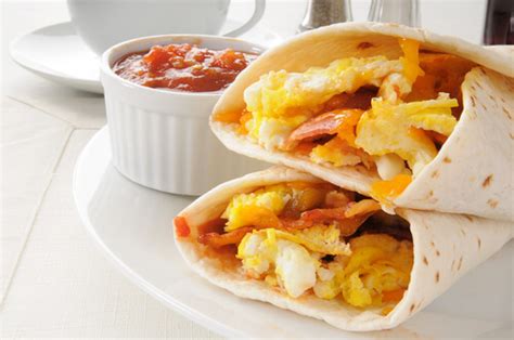 When the pan is hot, add a tortilla and sprinkle cheddar cheese all over. 3 Homemade Burrito Recipes | Natures Basket | Blog