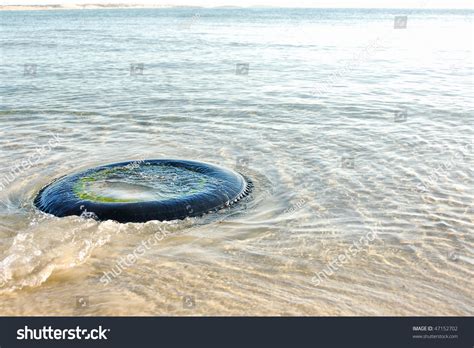 Tire Polluting The Ocean Water Stock Photo 47152702 Shutterstock
