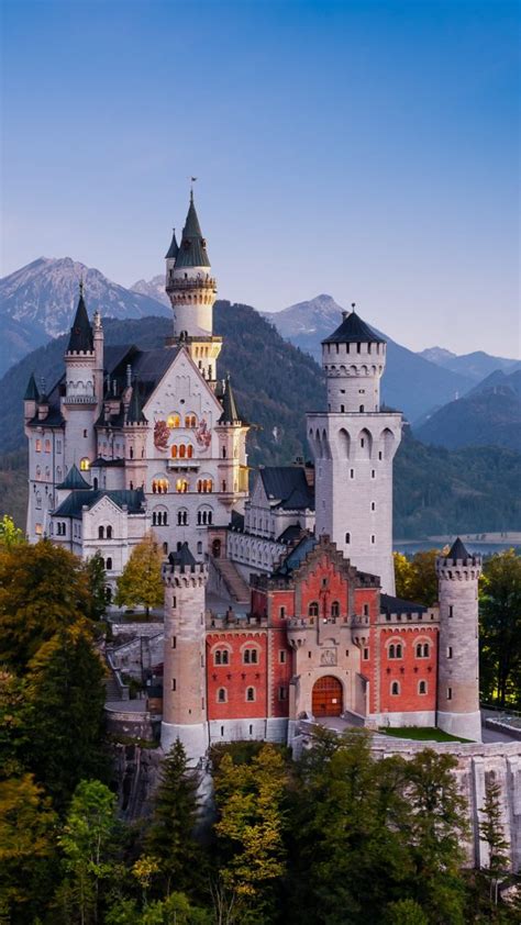 Famous Neuschwanstein Castle In Bavaria Germany Before Sunrise
