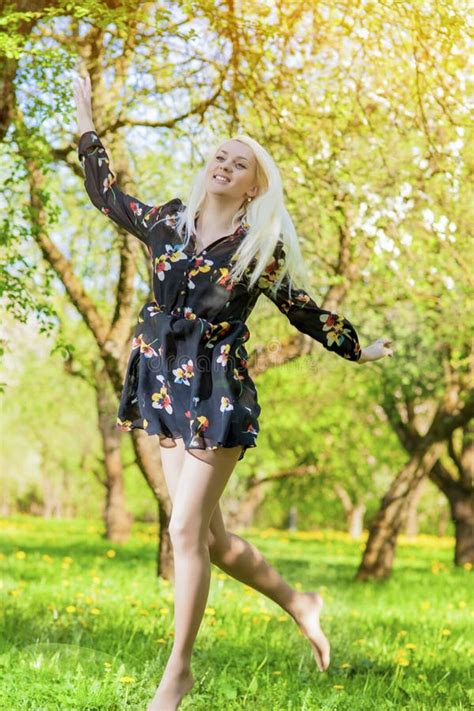 Young Forest Nymph Dancing In Blossom Spring Forest Stock Image Image