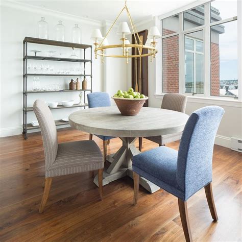 A large dining room table, comprising 12 places, will create a magnificent place for the whole family to. Round Gray Trestle Dining Table with Mismatched Dining Chairs - Transitional - Dining Room