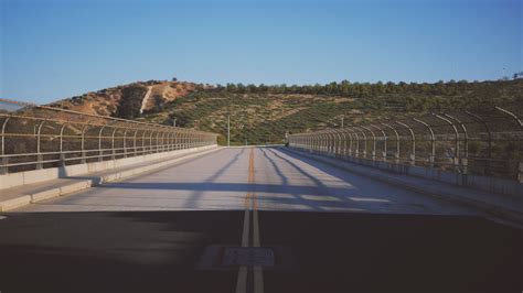 Free Images Fence Road Overpass Pavement Chainlink Stadium Hills Infrastructure Race