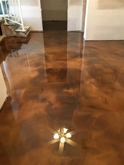 It can be applied to concrete, masonry, and aged asphalt. Incredible metallic epoxy flooring in the Lafayette LA ...