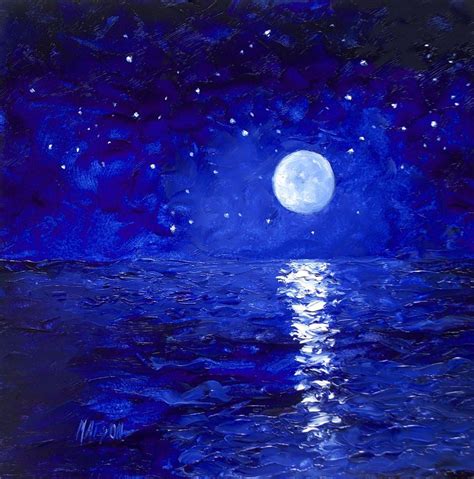 The Full Moon Shines Brightly In The Night Sky Over The Ocean With Blue