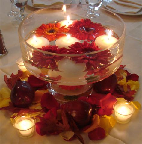 Gerber Daisies Floating Candles And Apples Centerpiece Red Candle