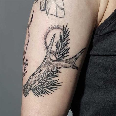 Antler And Pine Branch Tattoo Inked On The Left Arm Tree Tattoo Arm