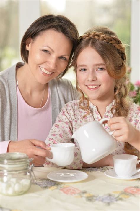 Mother And Daughter Drinking Tea Stock Photo Image Of Hope Drink