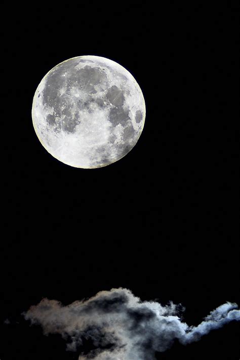 The Full Moon Looms Over Clouds | The full moon was visible … | Flickr