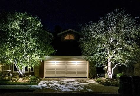 How Architectural Landscape Lighting Can Highlight Your Custom Garage