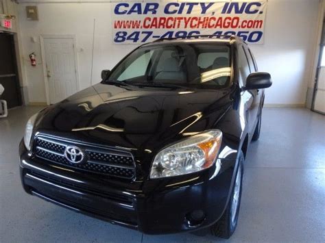 Accepting credit card payments is essential for the success of any business. 2006 Toyota RAV4 Base I4 4WD 104514 Miles Black 4 Door 4 Cylinder Engine 2.4L/14 - JTMBD33V065010755