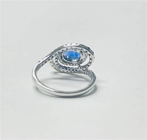 Blue Sapphire Oval And Diamond Engagement Ring In 18k White Gold For