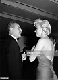 Marilyn Monroe with film producer Darryl Zanuck at the wrap party for ...