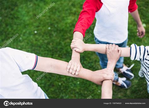 Children Holding Hands — Stock Photo © Alebloshka 159794920