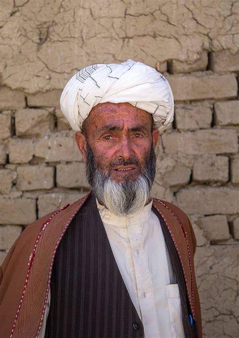 He was providing cover for the men in his. Afghan old man with a turban in the market, Badakhshan ...