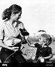 Jane Goodall and her son, Grub. ca 1976. Courtesy: CSU Archives/Everett ...