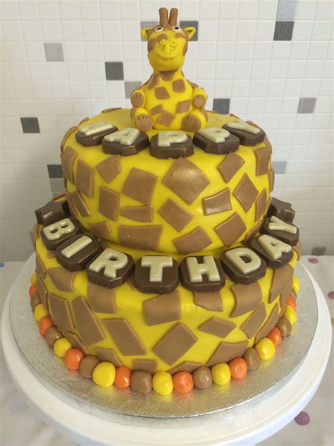 The birthday cakes that asda do where they print a photo of your choice onto a cake. Giraffe themed cake. Chocolate letters bought from Asda ...