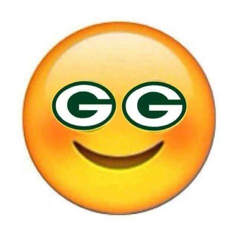 A Yellow Smiley Face With Green Eyes And The Letter G On Its Forehead