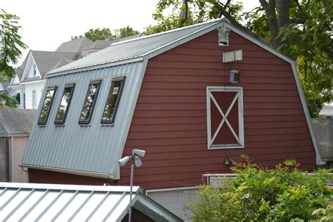 Silver Metal Roof On Mansard Style Barn Cabin Exterior Metal Roof