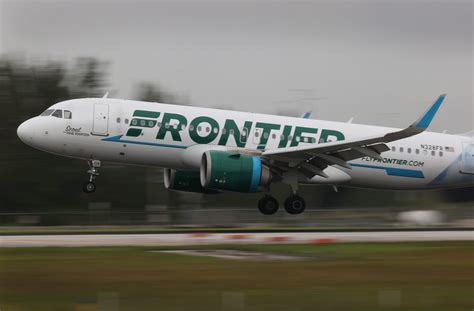 frontier airlines passenger taped to seat after allegedly groping attacking flight attendants