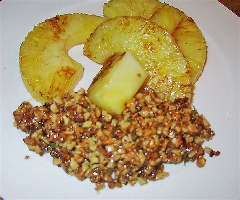 Jetzt ausprobieren mit ♥ chefkoch.de ♥. Ananas, gebraten mit karamellisierten Mandeln (Rezept mit ...