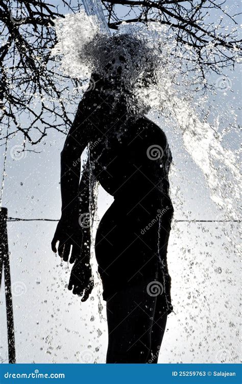 Woman Enjoys The Water Splash In The Outdoors Stock Image Image Of