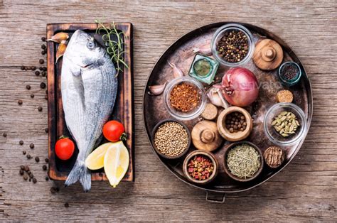 Raw Fish And Ingredients For Cooking Stock Photo By Nikolaydonetsk