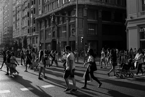 People Walking On Street In Grayscale Photography · Free Stock Photo