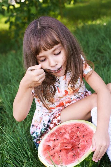 Funny Female Kid With Watermelon Slice Summer Child Picnic Stock Photo