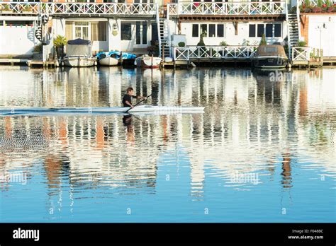 Single Scull Rowing Boat On The River At Henley On Thames In The Early