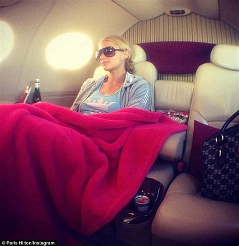 Paris Hilton Flaunts Her Decadent Lifestyle As She Poses In Front Of
