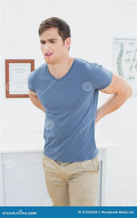 Handsome Man With Back Pain In Office Stock Photo Image Of Therapy