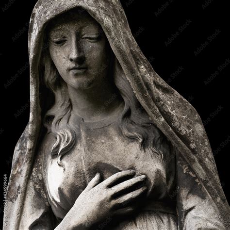 Mary Magdalene Praying Fragment Of An Ancient Statue Isolated On Black