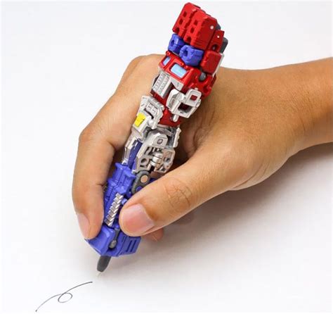 This Pen Transforms Into Optimus Prime Toy Gear Personajes