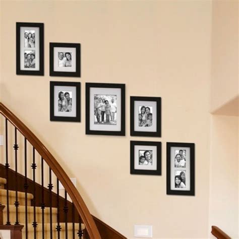 5 tips to make a gallery wall look polished and one simple trick to make it quick and easy to plan. 65+ Awesome Arranging Pictures On A Stair Wall Ideas ...