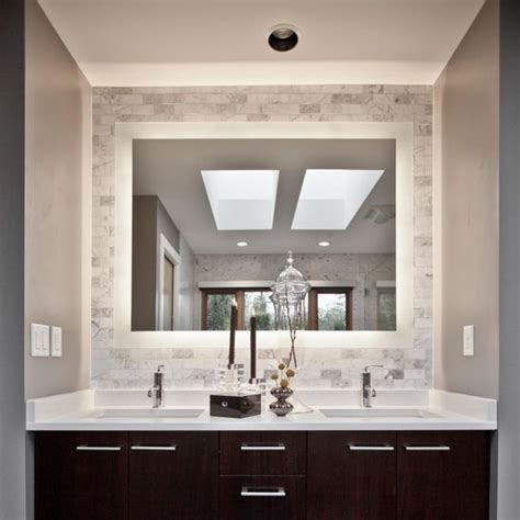One of the most important bathroom lighting ideas is to include a statement or feature light a bathroom tiled or wallpapered like this has plenty of texture to provide the perfect backdrop for beautiful architectural ceiling light. 5 Must-See Bathroom Lighting Ideas - Friel Lumber Company