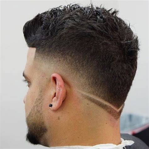 The temp fade haircut, also known as the temple fade, is a cool taper fade cut that incorporates a shape up or line up around a man's temples. 51 Best Men's Hairstyles + New Haircuts For Men (2020 ...