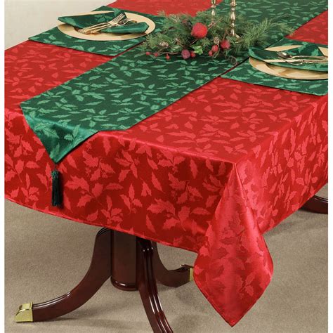 A festive addition to your holiday décor you'll use year after year. Lenox Holly Damask Holiday Table Linens