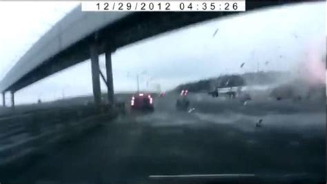 Russian Dash Cam Captures Moscow Plane Crashing Into Highway
