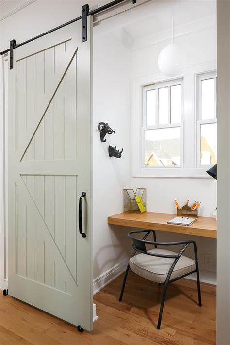 Small Home Office With Green Barn Door On Rails Transitional Den