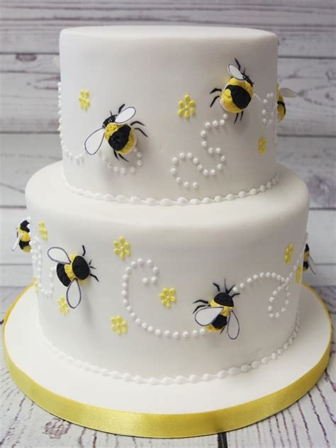 Find all the cake decorating tools and icing cutters you need to create fun fondant shapes and ice like a gem, including fondant letter cutters, cake turntables, flower plunger cutters, crimpers and more. Crafty Cakes | Exeter | UK - Bumble Bee Theme Wedding Cake