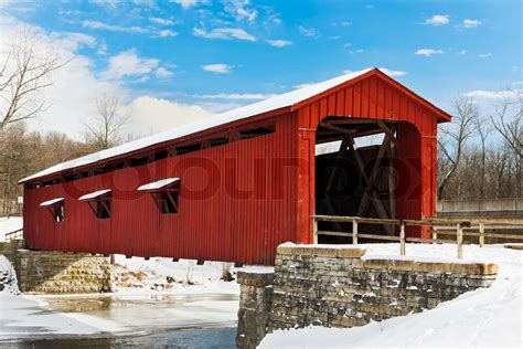 Red Covered Bridge With Snow Stock Image Colourbox