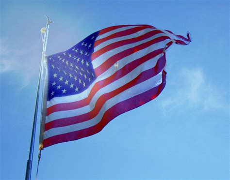 American Flag With Blue Sky Background Image Wallpaper Or Texture Free