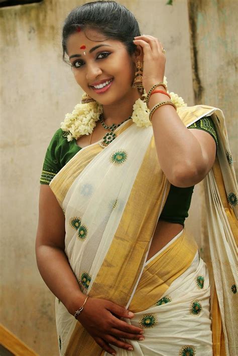 It marks the debut of qureshi, a bollywood actress, in. Malayalam Actress Navya Nair Smiling Stills In White Saree ...