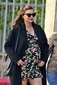Pregnant Miranda Kerr Shows Off Baby Bump in Floral Dress | Us Weekly
