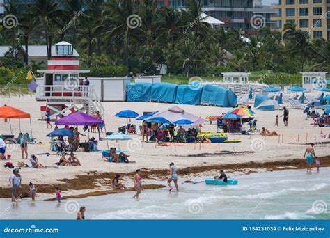 Summer Scene Miami Beach Crowded Sand And Lifeguard Tower Editorial