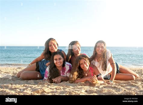 Group Of Happy Teen Girls At The Beach Stock Photo Alamy
