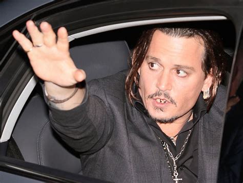 Johnny Depp Debuts Hang Tooth And Mouthful Of Metal Fillings At Black